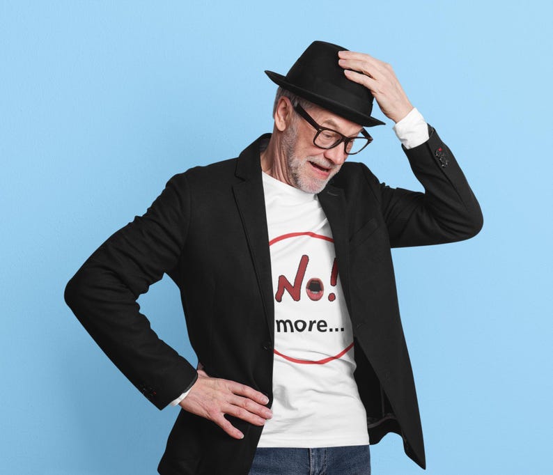 NO! MORE... is a wearable protest against escalation, conflict, noise and power without reflection.

This unisex graphic t-shirt combines raw hand-drawn typography with a human scream hidden inside the message — turning a simple phrase into a visual reaction.