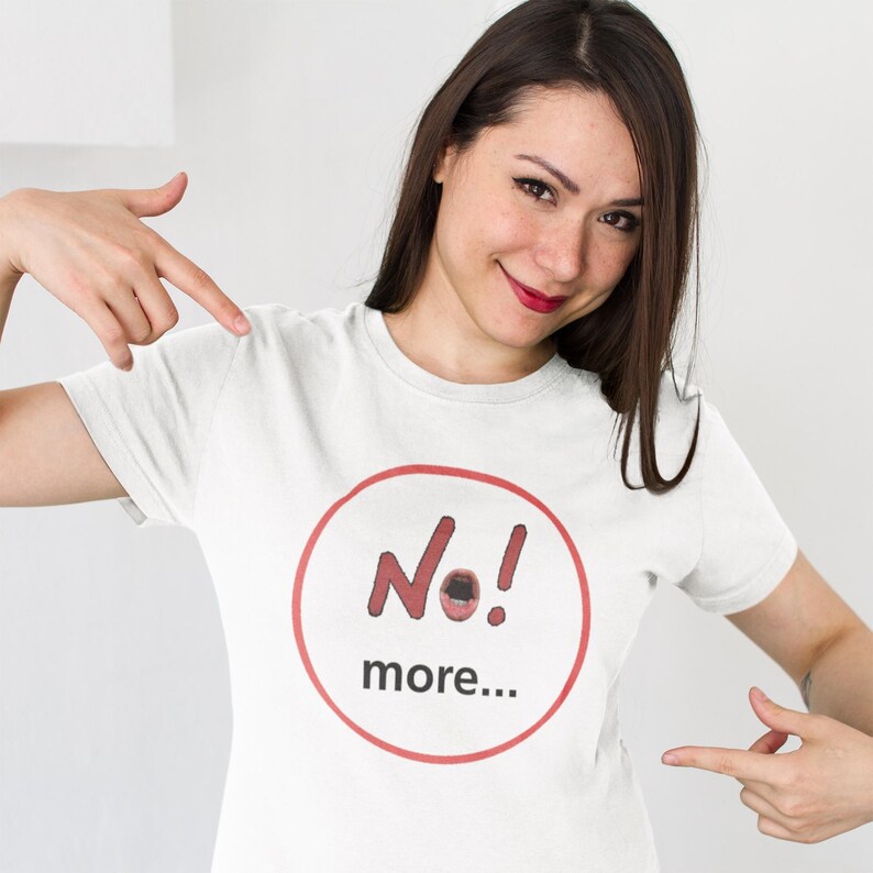 NO! MORE... is a wearable protest against escalation, conflict, noise and power without reflection.

This unisex graphic t-shirt combines raw hand-drawn typography with a human scream hidden inside the message — turning a simple phrase into a visual reaction.