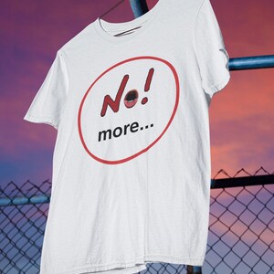 NO! MORE... is a wearable protest against escalation, conflict, noise and power without reflection.

This unisex graphic t-shirt combines raw hand-drawn typography with a human scream hidden inside the message — turning a simple phrase into a visual reaction.