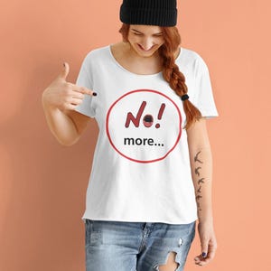 NO! MORE... is a wearable protest against escalation, conflict, noise and power without reflection.

This unisex graphic t-shirt combines raw hand-drawn typography with a human scream hidden inside the message — turning a simple phrase into a visual reaction.