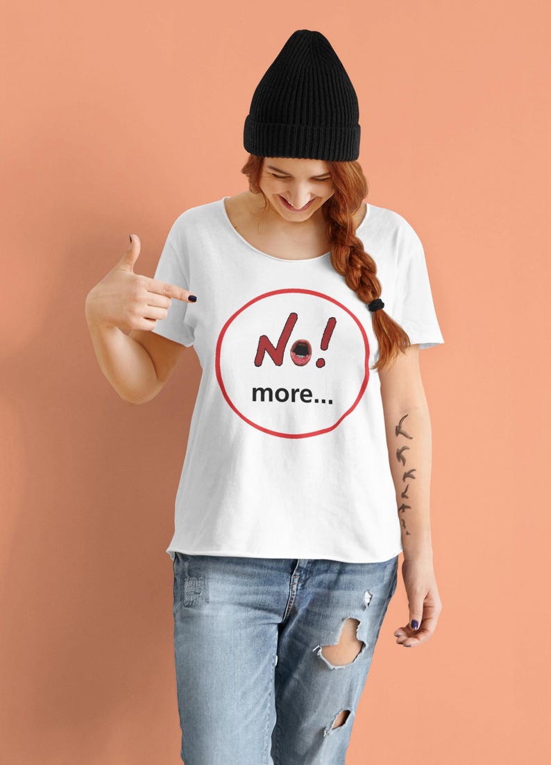 NO! MORE... is a wearable protest against escalation, conflict, noise and power without reflection.

This unisex graphic t-shirt combines raw hand-drawn typography with a human scream hidden inside the message — turning a simple phrase into a visual reaction.