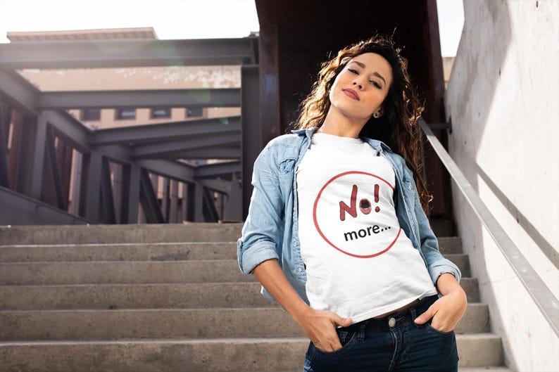 NO! MORE... is a wearable protest against escalation, conflict, noise and power without reflection.

This unisex graphic t-shirt combines raw hand-drawn typography with a human scream hidden inside the message — turning a simple phrase into a visual reaction.