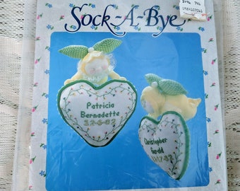 Cross Stitch Kit, Sock-a-Bye,  A Counted Cross Stitch Birth Record by Leisure Arts No. 706