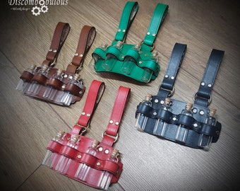 Leather belt hanger with bottles.
