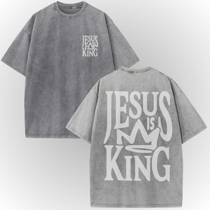 A gray t-shirt with white text on the back.