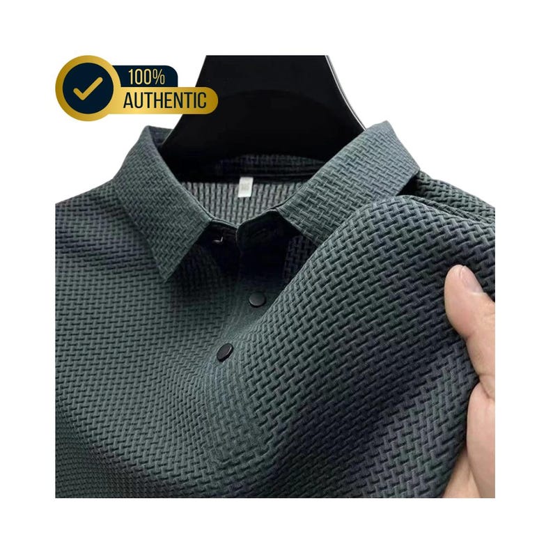 May include: Dark gray collared shirt with a textured weave pattern. The shirt has black buttons and a classic collar. The image includes a gold badge that says "100% AUTHENTIC".