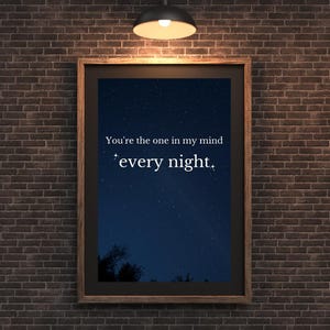 May include: A framed print with a dark blue starry night sky background. The text "You're the one in my mind every night." is printed in white on the print.