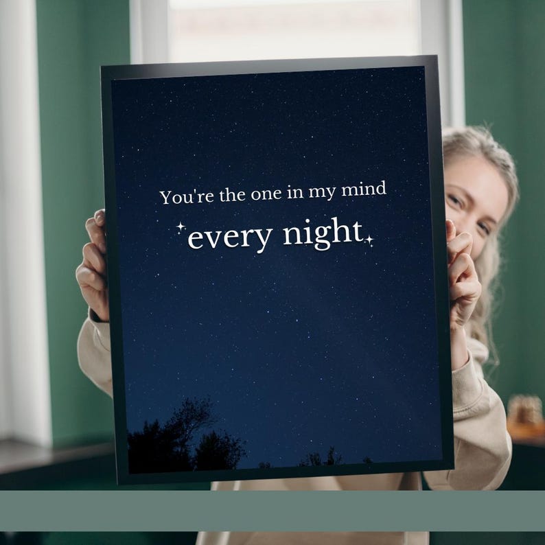 May include: A black framed print with a dark blue starry night sky background. The text "You're the one in my mind *every night*" is printed in white.