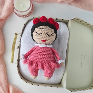 Handmade Crochet Frida Doll – Amigurumi Frida Doll Plush with Pink Onesie | Baby Shower Gift | Newborn Gift | Soft Baby Toy | Nursery Decor
