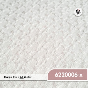 May include: White fabric with a textured, repeating square pattern. The fabric has a subtle, raised design. The number "6220006-x" is displayed on a pink label. The text "Harga Per : 0,5 Meter" is also visible.