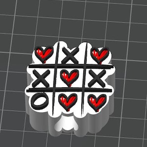 May include: A white, heart-shaped tic-tac-toe game with black lines and symbols. The game pieces include black X's, a black O, and red heart shapes. The design is set against a grey grid background.