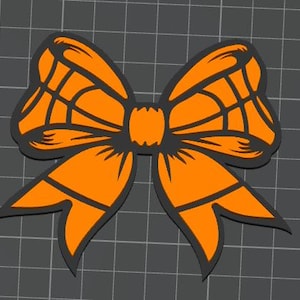 May include: An orange bow with a dark gray outline, set against a gray grid background. The bow's design features a detailed pattern within its loops and tails, creating a decorative element.