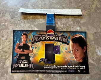 Vintage PS2 PlayStation Pepsi Promo Lara Croft Tomb Raider Shelf Talker Poster. Comes as pictured