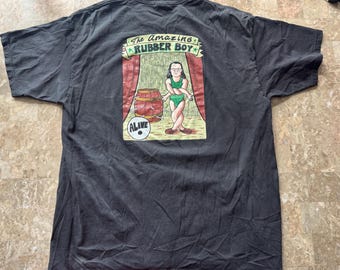 Camiseta vintage Penn & Teller "The Amazing Rubber BOY ALIVE" Crew XL con etiqueta Hanes