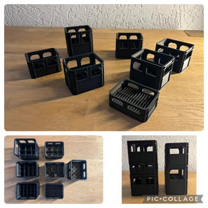 Könnte beinhalten: Eine Sammlung von zehn schwarzen Plastikkisten, einige übereinander gestapelt. Die Kisten sind alle gleich groß und gleich geformt und haben ein Gittermuster an den Seiten.