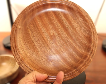 Hand turned sapele dish. Chatoyance throughout, one of a kind piece for home decor or gift