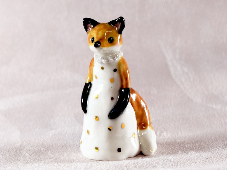 Little red fox figurine wearing a white dress with gold spots ceramic figurine sculpture ooak fox totem image 1