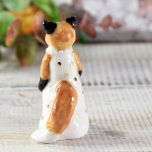 Little red fox figurine wearing a white dress with gold spots ceramic figurine sculpture ooak fox totem image 8