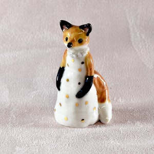 Little red fox figurine wearing a white dress with gold spots ceramic figurine sculpture ooak fox totem image 2