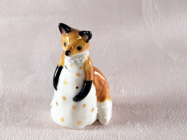 Little red fox figurine wearing a white dress with gold spots ceramic figurine sculpture ooak fox totem image 3