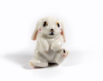 Miniature ceramic rabbit figurine with 24k gold trim, hand sculpted by Anita Reay bunny