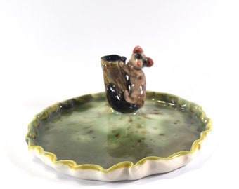 possum ring dish or teaspoon holder / organic shaped trinket dish by Anita Reay Australian pottery souvenir dark green tone dish