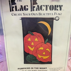 May include: A packaged Halloween flag kit from The Flag Factory. The design features two smiling jack-o'-lanterns, a crescent moon, and the text "PUMPKINS IN THE NIGHT." The flag is designed to finish at 28" x 49".