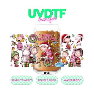 May include: A clear glass can-shaped cup with a brown liquid inside, featuring a festive Christmas design. The design includes cartoon characters, candy canes, and the words "MERRY CHRISTMAS". The text "UVDTF transfer" is at the top.