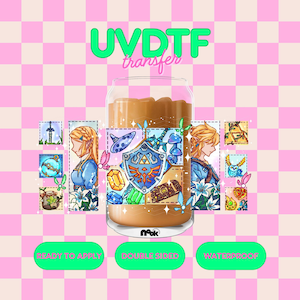 May include: A clear glass can-shaped cup with a brown liquid inside, featuring a colorful UVDTF transfer design. The design includes images of a shield, characters, and text that reads "READY TO APPLY", "DOUBLE SIDED", and "WATERPROOF". The background is a pink and white checkered pattern.