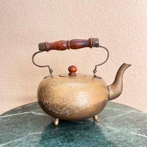 Patina, Age Wear - Vintage Ornate Foliage Design Brass Etched Footed Teapot with Brown Wooden Handle | Heavy Chai Metal Kettle Made in India
