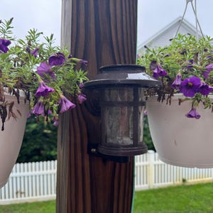 May include: A set of three ceramic mugs with a speckled, matte finish. The mugs are in shades of cream, light gray, and dark gray. Each mug has a simple, minimalist design, perfect for coffee or tea.