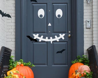Adesivo de porta com rosto de abóbora para o Halloween: Decoração assustadora em vinil