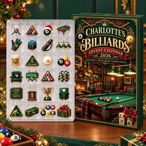 May include: A Charlotte's Billiards 2026 advent calendar box featuring a festive pool room scene and a clear plastic tray containing twenty-four miniature ornaments shaped like billiard balls, cues, trophies, and pool-themed holiday items.