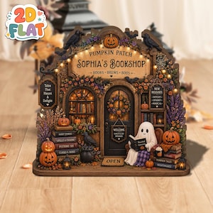 May include: A decorative wooden sign shaped like a bookshop storefront with the text "Pumpkin Patch Sophia's Bookshop Books Brews Boos". It features a ghost reading a book, pumpkins, ravens, a wreath, and stacks of books with titles like "Ghost Stories".