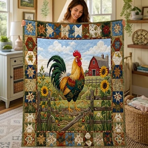May include: A rectangular quilt featuring a central scene of a colourful rooster standing in a field with sunflowers and a red barn in the background. The central image is framed by a border of small, multi-coloured star-shaped fabric patches.