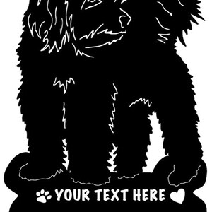 May include: Black silhouette of a dog standing on a bone-shaped sign with the text "YOUR TEXT HERE" and a paw print and heart.