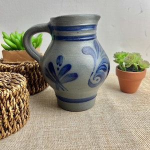 Vintage German Salt Glaze Pitcher with Cobalt Blue Folk Motif – Stoneware Jug Rustic Farmhouse Decor