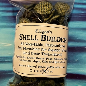 May include: A clear plastic bag filled with green, textured snail food. The label reads "C. Lyon's Shell Builder" and lists ingredients like green beans and peas. The bag contains 2 oz of product.