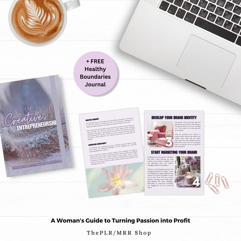 May include: A pink and white book titled "Creative Entrepreneurship: A Woman's Guide to Turning Passion into Profit" with a pink feather on the cover. The book is open to a page with the title "Develop Your Brand Identity" and a pink sofa. The next page is titled "Start Marketing Your Brand" and has a pink cup of coffee on a table. The book is on a white surface with a laptop and a cup of coffee.