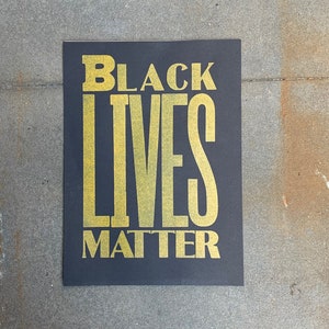 Black Lives Matter yellow on black print image 1