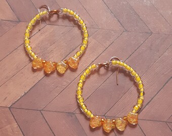 Orange beaded hoops with speckled beads