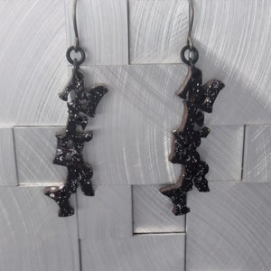 Black MERRY letters with silver glitter