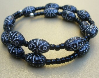 Black and white Czech glass bead double wrap bracelet on memory wire.
