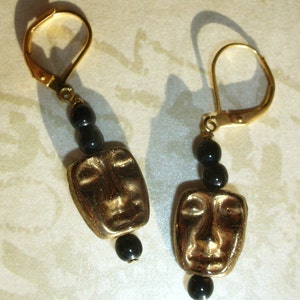 Mystery faces. Bronze human head earrings. With gold-filled lever back ear wires.