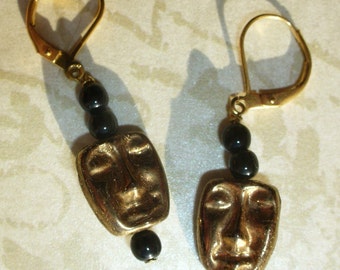 Mystery faces. Bronze human head earrings. With gold-filled lever back ear wires.