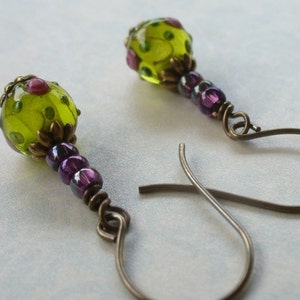 Lampwork bead earrings - Green with pink roses -  with copper-colored niobium hooks