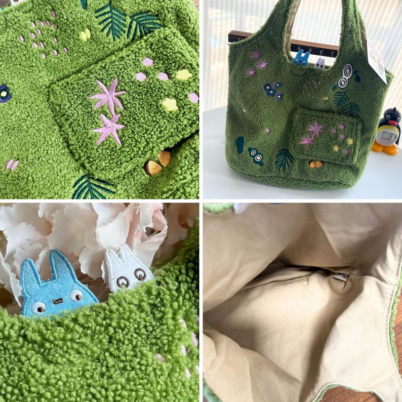 K&ouml;nnte beinhalten: Eine gr&uuml;ne Tragetasche mit einer strukturierten, pl&uuml;schigen Au&szlig;enseite. Die Tasche hat gestickte Blumen- und Blattmotive in Rosa, Gelb und Gr&uuml;n. Auf der Vorderseite befindet sich eine kleine Tasche. Das Innere der Tasche ist ein hellbeiger Stoff. Zwei Zeichentrickfiguren sind sichtbar.