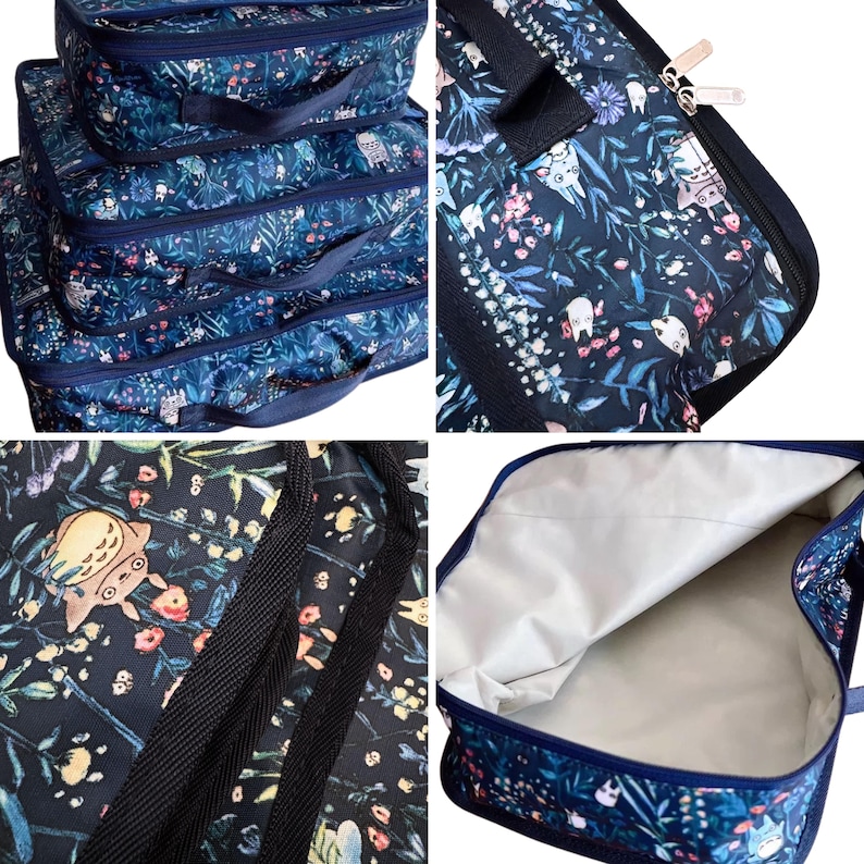 Puede incluir: Un juego de cuatro cubos de embalaje azul marino con un estampado floral y de criaturas del bosque. Los cubos tienen asas y cremalleras negras. El interior del cubo m&aacute;s grande es blanco.