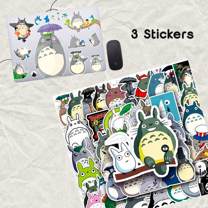 May include: A collection of colorful Totoro stickers, featuring various poses and expressions of the character. Some stickers are applied to a laptop, while others are loose. A black computer mouse is also present.
