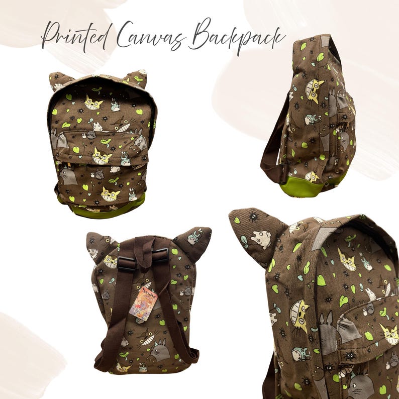 May include: Brown canvas backpack featuring a repeating pattern of cartoon characters and green detailing. The backpack has a unique design with cat-like ears and a green base. The text "Printed Canvas Backpack" is at the top.